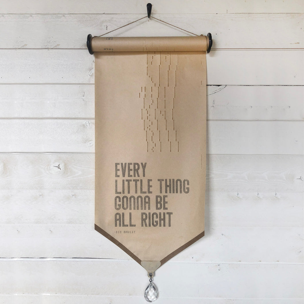 Every little thing gonna be alright. - Bob Marley  Our vintage piano roll sign adds unique charm and one-of-a-kind gift giving for the music lover in your life!  D E T A I L S • Each piano roll is vintage and has flaws and character from use and age. • Twine included for hanging. • Black ink printed on piano roll. • Glass crystal included as adornment. • 12